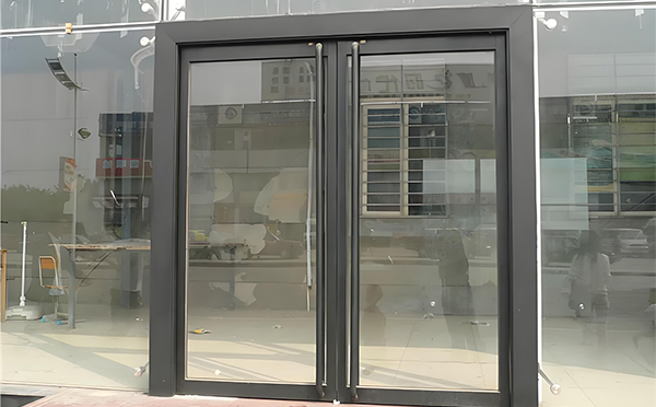昆玉玻璃地弹门